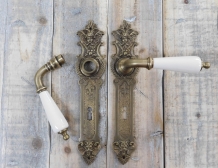 Set of door handles with long plates PZ 72 - patinated brass - handles made of porcelain