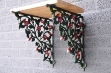 Beautiful set of shelf supports, shelf supports rose motif, cast iron-in matching color.