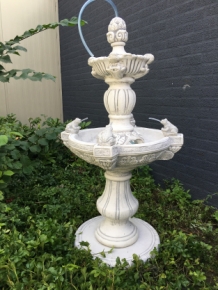 Garden fountain with spitting frogs - full stone