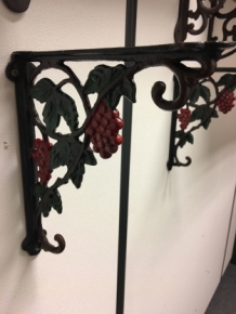 Beautiful shelf hanger with grape motif, cast iron-small