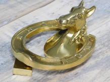 Door knocker horse head on horseshoe, brass gloss.