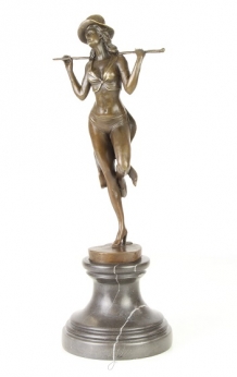 A bronze statue/sculpture of a theater dancer