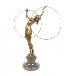 A bronze statue/sculpture of a naked hula hoop dancer