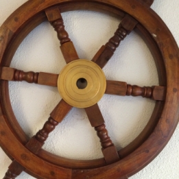 Solid wooden boat steering wheel with copper hub