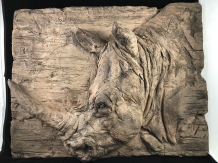 Wall ornament wood look with 3D image of a rhino, polystone-wood.