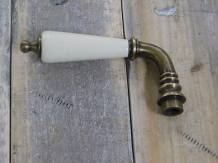 1 door handle brass with antique white ceramic handle, with mandrel.