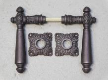 Set of door handles - including rosettes - iron - red/brown rusted