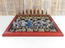 A chess game with the theme: ''MEDIEVAL KNIGHTS'', beautiful chess pieces as medieval knights