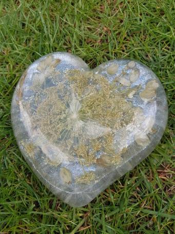 Beautiful flowers cast in epoxy resin heart