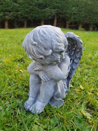 Angel, sitting sweet angel