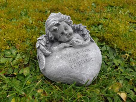 tomb statue in a heart with angel