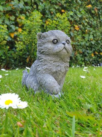 Cat with ball, concrete statue