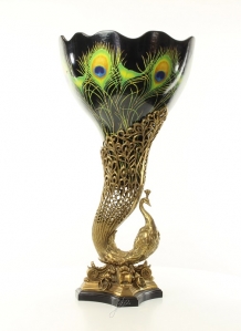 A bronze mounted porcelain peacock vase