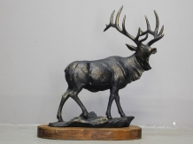 Statue of the fallow deer - cast iron with hardwood base