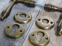 Set of door hardware - patinated brass - cylinder lock suitable