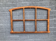 Cast iron window fitted with arches, stable window.