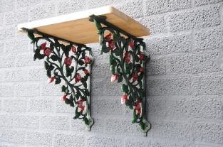 Beautiful set of shelf supports, shelf supports rose motif, cast iron-in matching color.