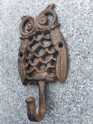 Wardrobe hook based on an owl, metal cast iron