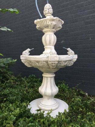 Garden fountain with spitting frogs - full stone