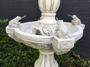 Garden fountain with spitting frogs - full stone