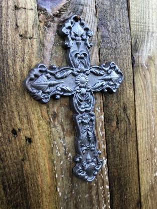 Cross made of cast iron, rusty