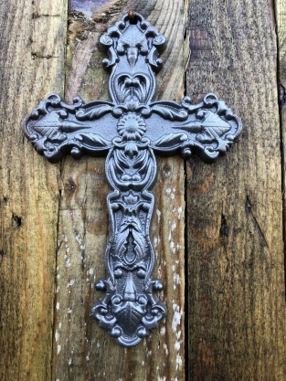 Cross made of cast iron, rusty