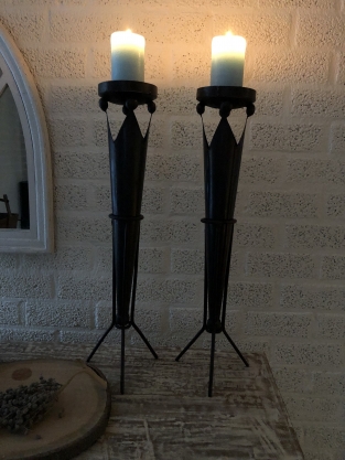 Set of beautiful standing metal castle torches with crown