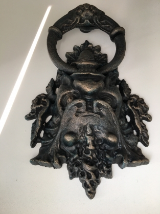 Cast iron door knocker with devil's head, very distinctive and beautiful!