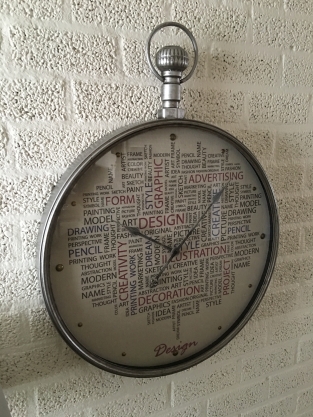 Large sturdy design-trendy metal wall clock.