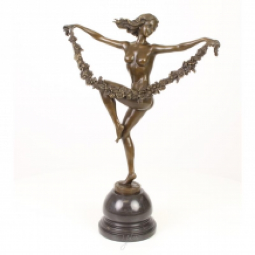 A bronze statue/sculpture of a flower dancer