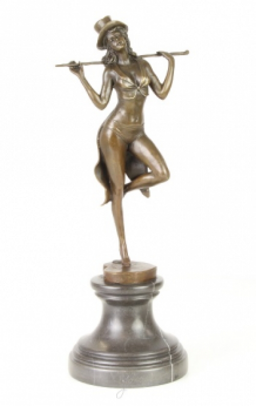 A bronze statue/sculpture of a theater dancer