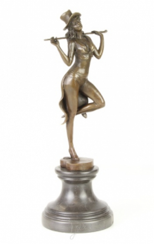 A bronze statue/sculpture of a theater dancer