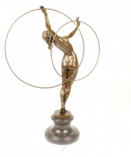 A bronze statue/sculpture of a naked hula hoop dancer