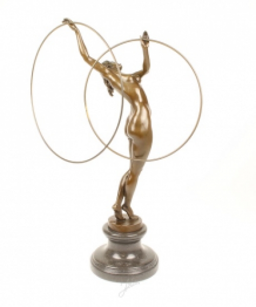 A bronze statue/sculpture of a naked hula hoop dancer