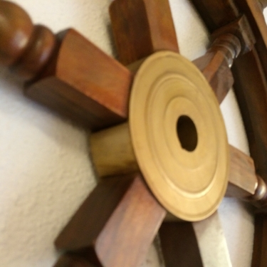 Solid wooden boat steering wheel with copper hub