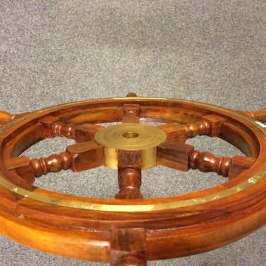 Solid wooden boat steering wheel with copper hub