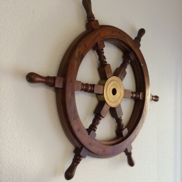 Solid wooden boat steering wheel with copper hub