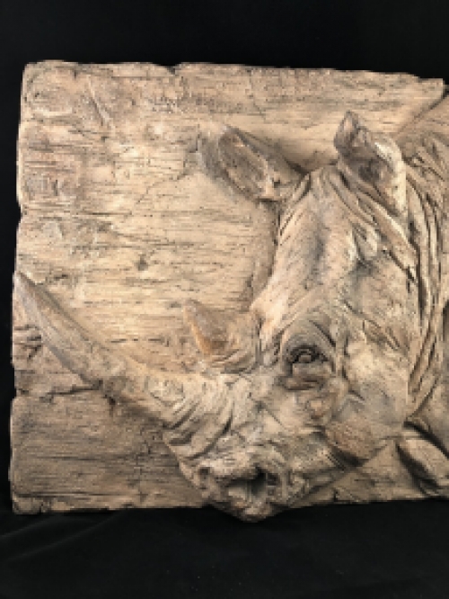 Wall ornament wood look with 3D image of a rhino, polystone-wood.