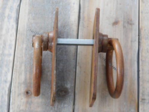 Rustic large rust colored rings as a door shutter/gate shutter set, beautifully nostalgic.