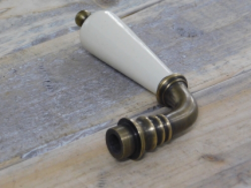 1 door handle brass with antique white ceramic handle, with mandrel.