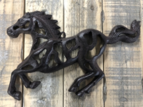 Wall ornament abstract image of a running horse, cast iron brown.