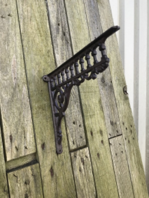 Set of antique sleek shelf supports, cast iron.