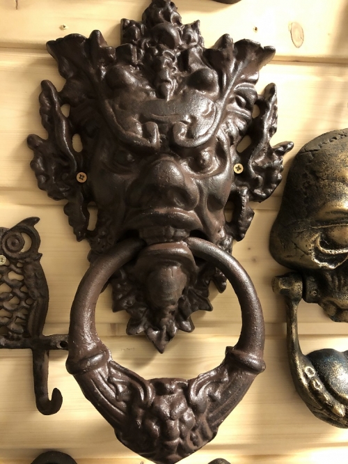 Cast iron door knocker with devil's head-dark brown, very distinctive!