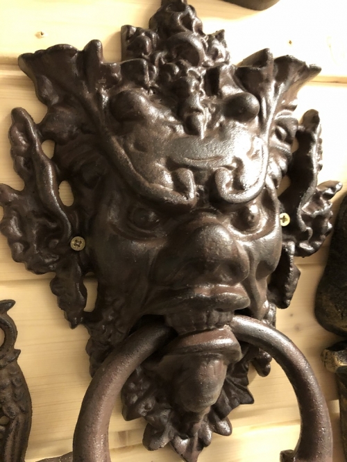 Cast iron door knocker with devil's head-dark brown, very distinctive!