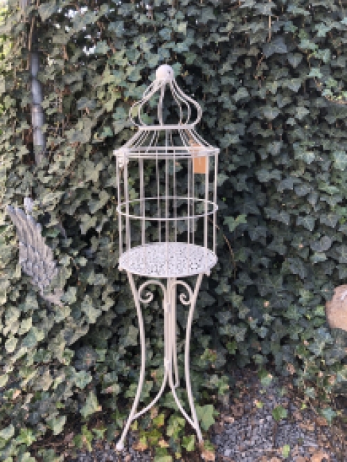 Birdcage standing on graceful wrought iron legs, a piece of jewelry!!