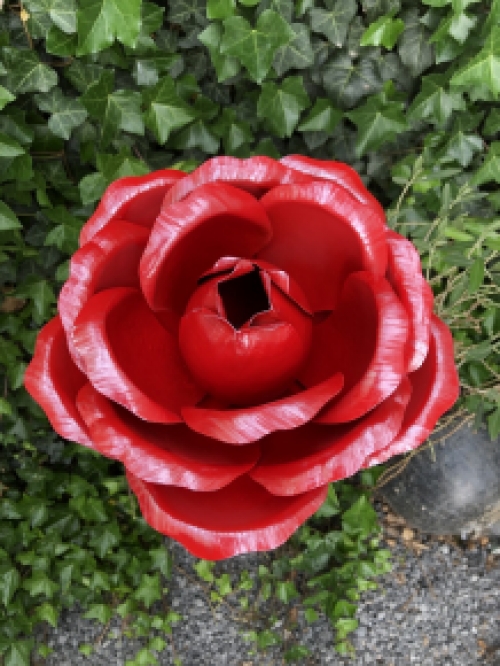 A work of art, this large rose made entirely of metal.