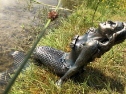 Beautiful mermaid cast iron bronze-brass statue.