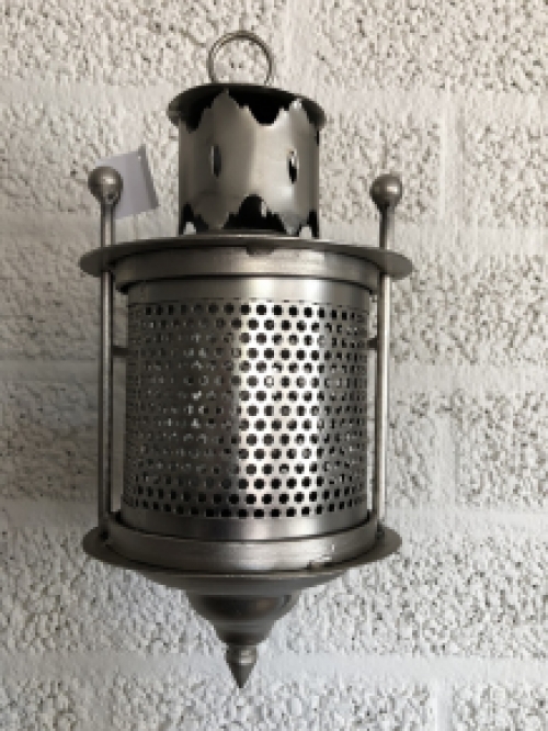 Wall lantern metal gray, perforation part to pass the light on the wall!