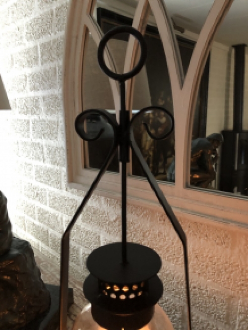 Candlestick, storm lantern, metal-glass, black, beautiful wrought ironwork.