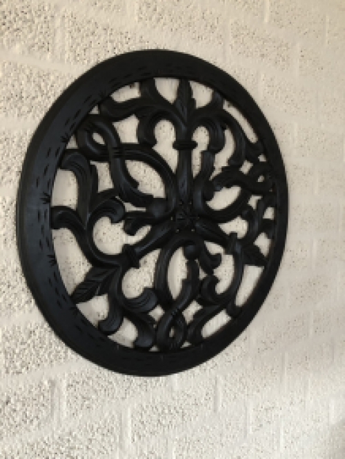 Wall ornament round, beautifully carved, black-brown, small